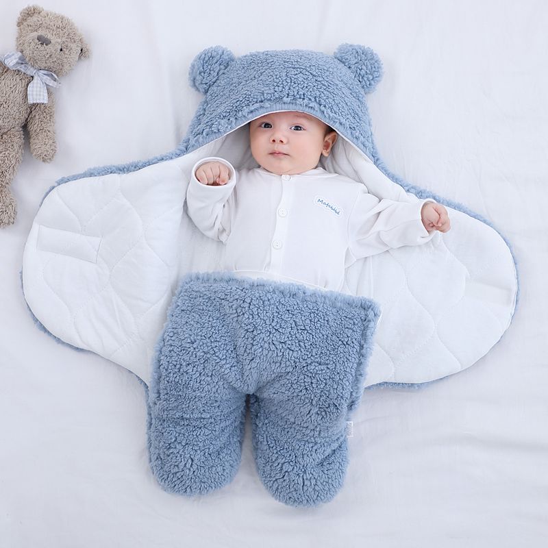 Baby sleeping with outlet blanket at 6 months